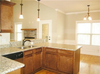 Decorative trim in kitchen includes crown molding,