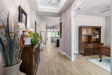Foyer to Hall with Office to Right