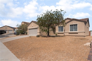 View of front of property with concrete driveway,