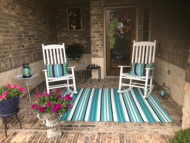 FRONT PORCH  Perfectly inviting. Let's guests know they are welcome, expected . . . and to Come On In.