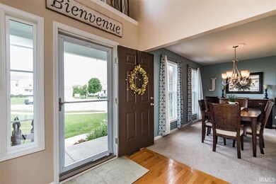 Open 2 Story Foyer with Hardwood Flooring.