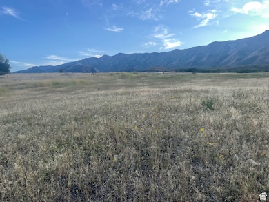 View of mountain feature with a rural view