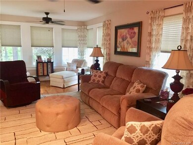 The Family Room fills with natural lighting. It pr