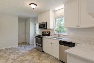 Toward rear door to deck and laundry room.