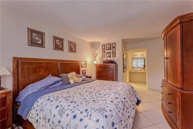 Master bedroom with ensuite bathroom and makeup va