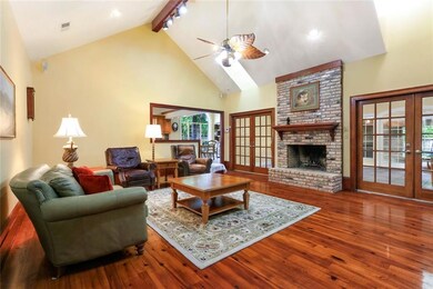 Spacious Den with vaulted ceiling & wood burning f