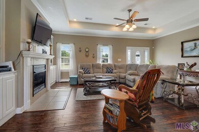 Beautiful wood flooring, tray ceiling, crown moldi