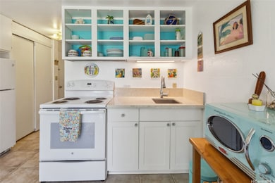 Updated kitchen cabinet and countertop are enhance