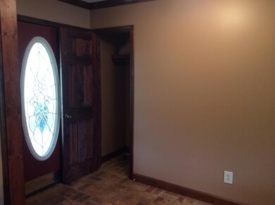 Coat closet off foyer