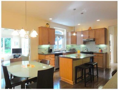 Kitchen Upscale cabinetry and corian counters with