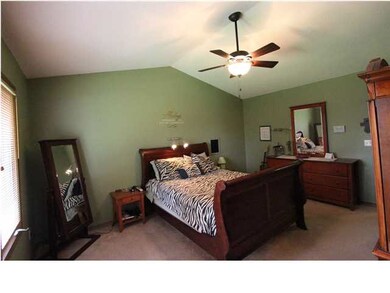Master Suite with vaulted ceilings and private bat