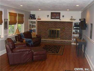 Family Room. Spacious Family Room with Fireplace. 