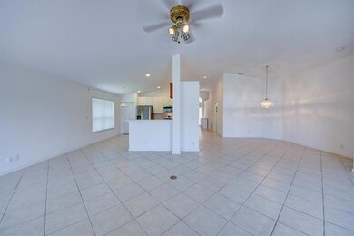 Living Room Opens to Dining Room
