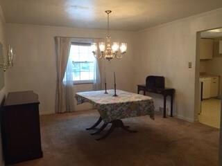 Dining room - hardwood floors underneath carpeting