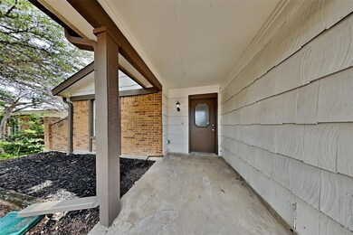 Doorway to property with a patio