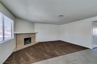 Unfurnished living room featuring carpet flooring,
