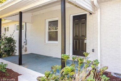 Front Porch, opens to Den
