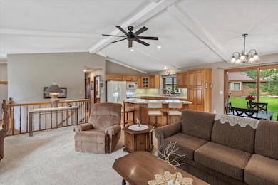 Great Room w/Beamed/vaulted ceiling