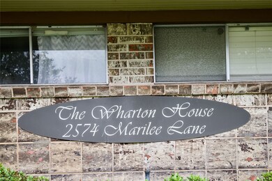 Sign and Front of Bldg