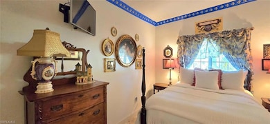 Bedroom with baseboards