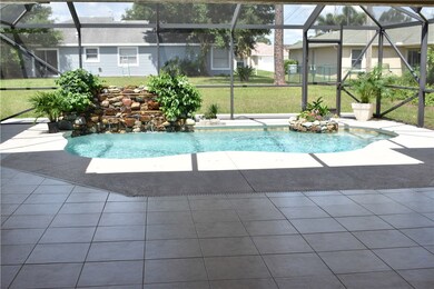 Beautifully landscaped pool with waterfall