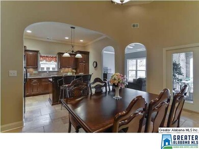 The dining room is centered just adjacent to the k