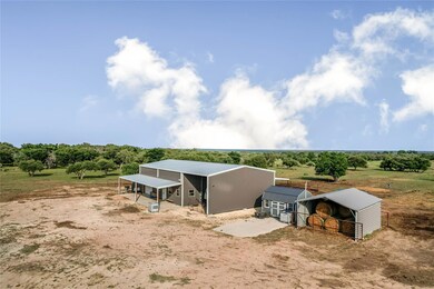 View of pole building with a view of rural / past