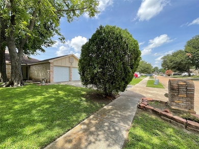 Located in a quiet neighborhood with a wide street