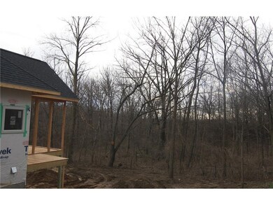 The perfect setting for a large screened-in porch 