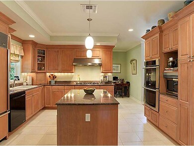Photo. Island Kitchen, granite counters, upscale appliances