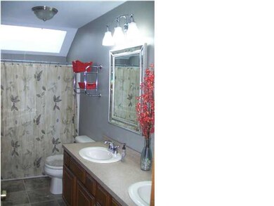 MASTER BATH FEATURES DOUBLE SINKS, NEW COUNTERTOP,