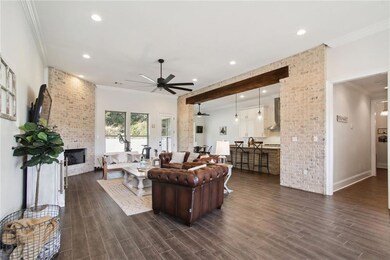 Open floor plan living room, dining room, and kitc