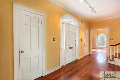 Foyer has beautiful leaded glass surround on front