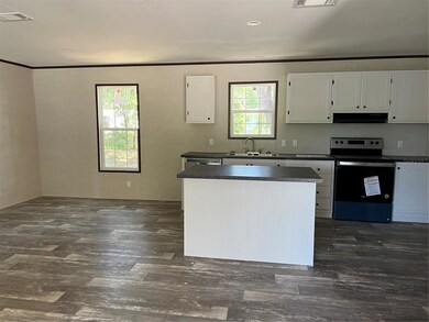 A kitchen island for food prep, breakfast and ente