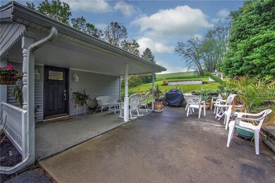 ANOTHER SPECTACULAR VIEW OF THE FRONT PORCH AND TH