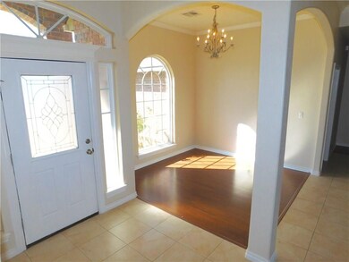 Foyer opens up to the open two living areas