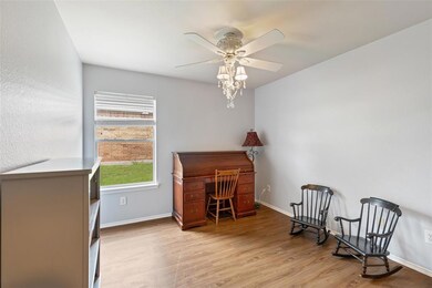 Bedroom 3 with Ceiling Fan and walk-in closet