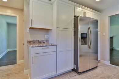 Beautifully designed kitchen with brand new hardwo