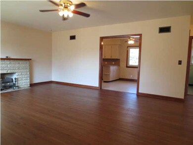 Living room looking into kitchen