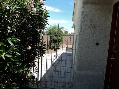 Property Photo. side entry w/gate to back yard.