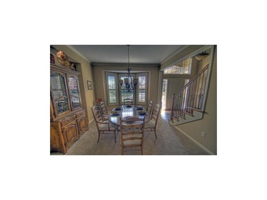 Formal Dining room with plantation shutters