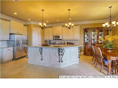 The Kitchen has a spacious breakfast bar, granite 