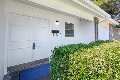 View of property entrance with covered front porch