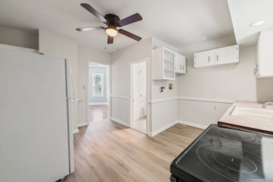 Unit 1: 1st floor: kitchen with laundry hookups