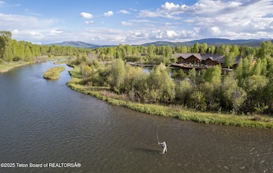 Fly Fisherman In Fish Creek