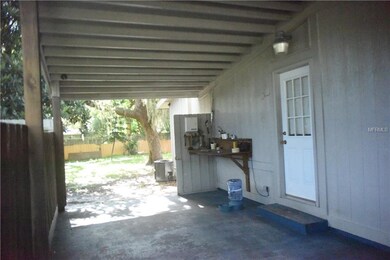 Carport space side entry another gate to backyard 
