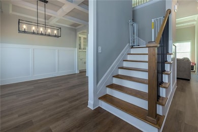 Stairs with beam ceiling, coffered ceiling, a nota