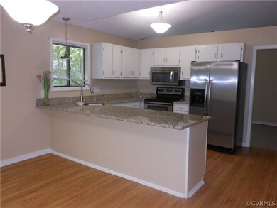 Breakfast Bar, Granite Counter tops and Stainless