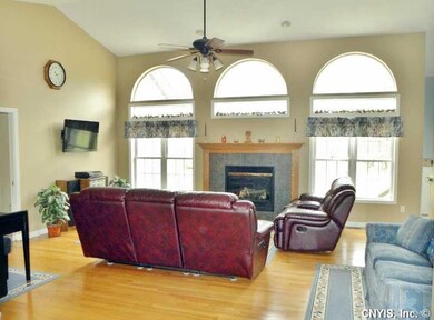 Great Room. Wall of windows and gas fireplace make