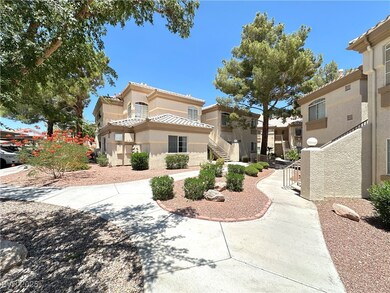 View of front of house featuring stucco siding, a